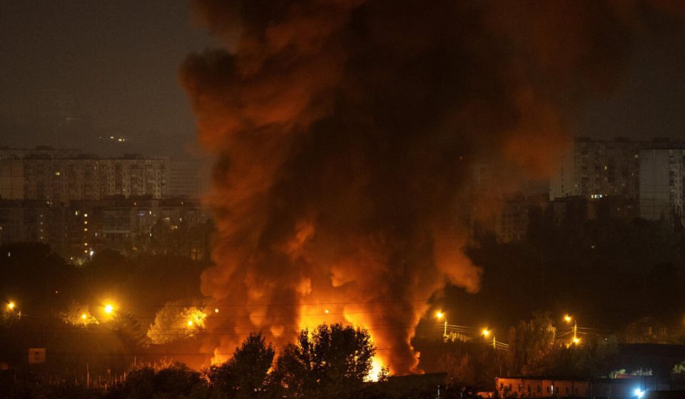 Rescuers search a damaged apartment building in Pryluky after Russia attacks Ukraine with drones and missiles