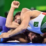 Pakistani wrestlers Inayat Ullah and Muhammad Gulzar compete in freestyle bouts at the Asian Games in Nagoya