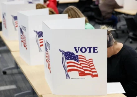 Voters casting ballots at an early voting polling station in Texas