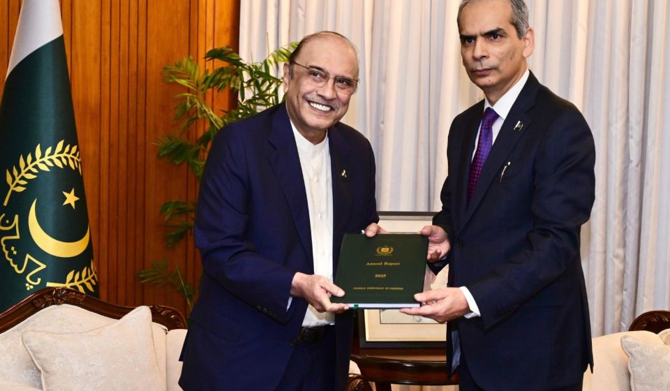 President Asif Ali Zardari receives the Wafaqi Mohtasib Annual Report for 2025 from Federal Ombudsman Naveed Kamran Baloch.