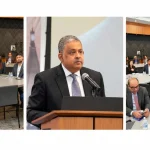 Pakistan and US flags displayed at a technology and business networking event representing bilateral technology cooperation and investment.