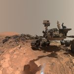 NASA Curiosity rover Mars dawn image showing sunlight on wind-carved crags called yardangs on Mount Sharp