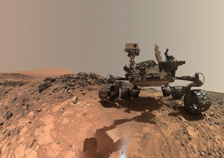 NASA Curiosity rover Mars dawn image showing sunlight on wind-carved crags called yardangs on Mount Sharp