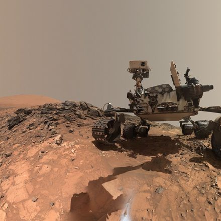 NASA Curiosity rover Mars dawn image showing sunlight on wind-carved crags called yardangs on Mount Sharp
