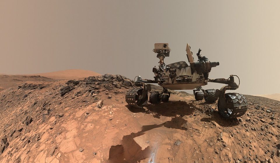 NASA Curiosity rover Mars dawn image showing sunlight on wind-carved crags called yardangs on Mount Sharp