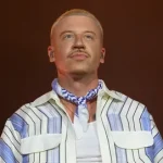 Macklemore performing on stage as his Free Palestine tour sells out in Dublin, Paris and London