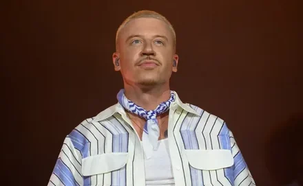 Macklemore performing on stage as his Free Palestine tour sells out in Dublin, Paris and London