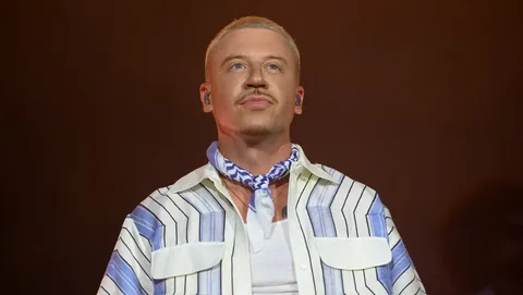 Macklemore performing on stage as his Free Palestine tour sells out in Dublin, Paris and London